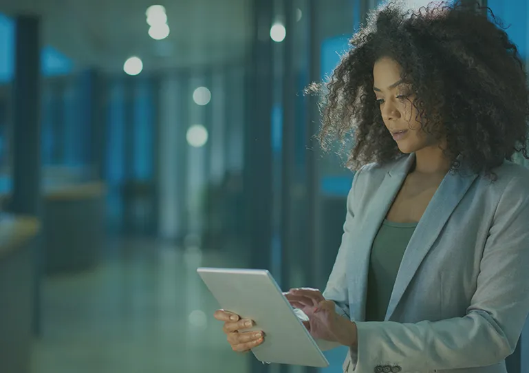 A recruiter managing content on a tablet