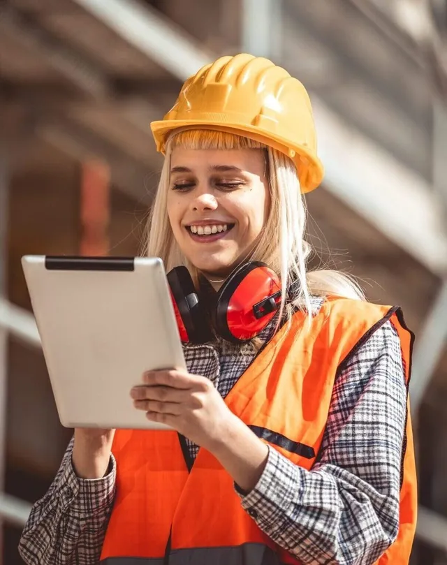 A worker viewing jobs on a tablet